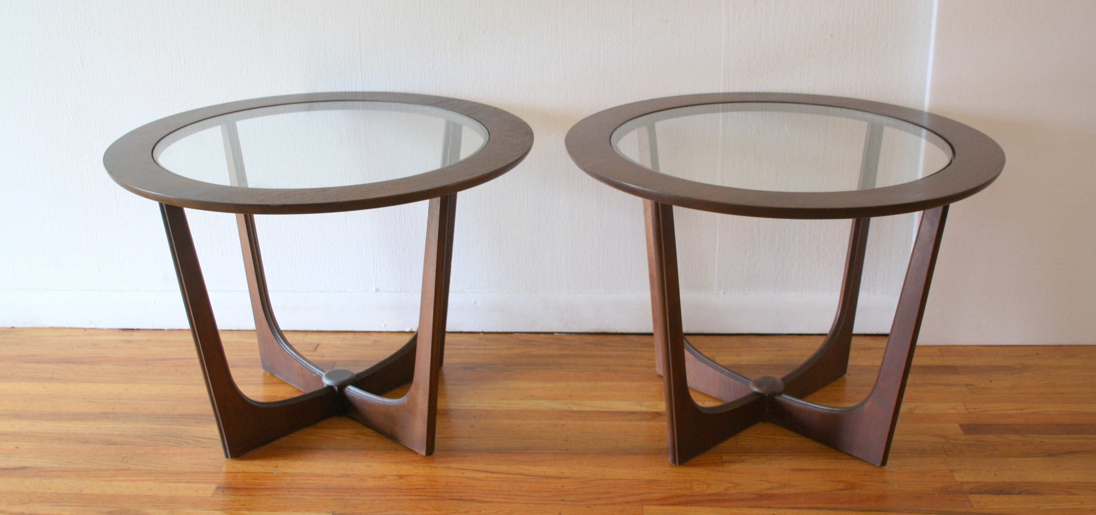 pair of Bassett round glass topped side tables 1